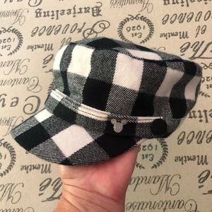 Black and white train conductor hat